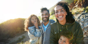 Cropped shot of a family of four spending the day outdoors.